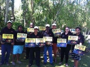 QRAM Board Staff Holding Network Signs