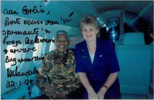 Nelson Mandela with Flight attendant, Corlia Henn 