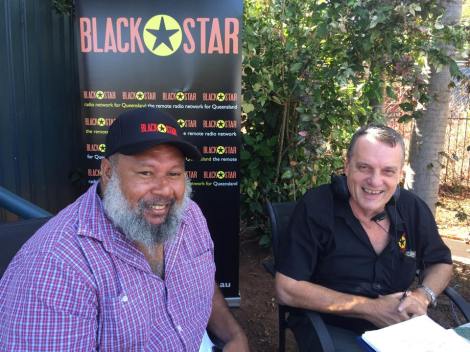 Councilor Eddie Newman speaks to Greg Reid on Black Star